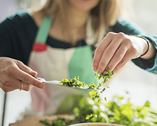 Woman making a salad